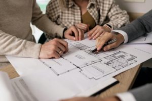 property managers discussing building plans